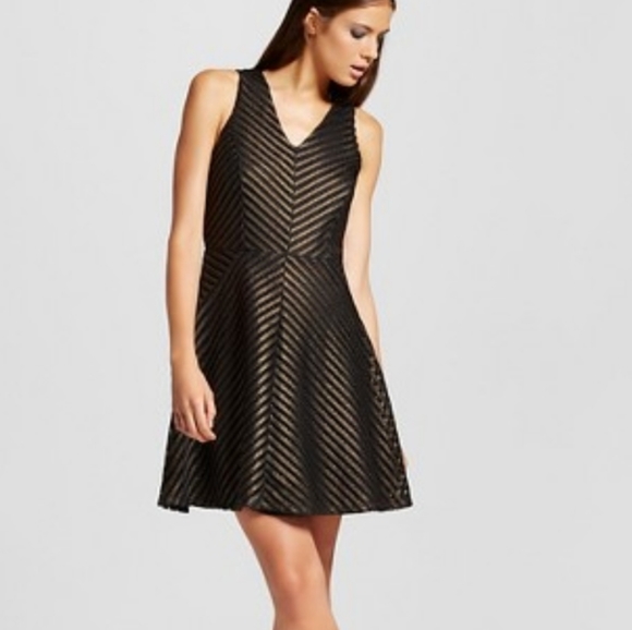 black and gold fit and flare dress
